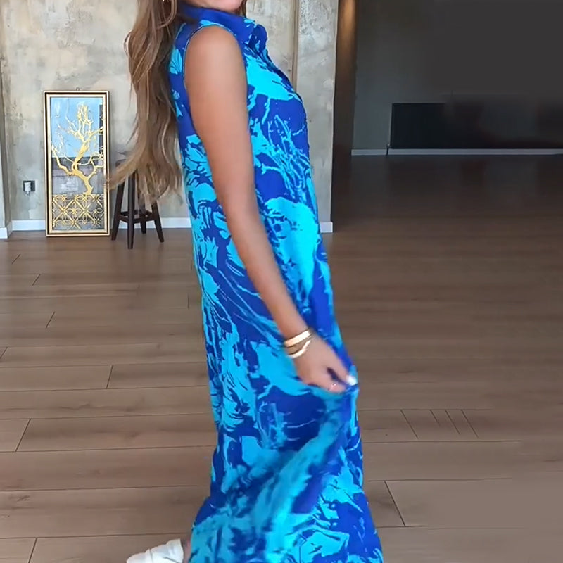 🌺 Robe Longue Sans Manches à Imprimé Exotique – Look Île & Coucher de Soleil 🌅 ✨ Tissu Léger & Coupe Élégante – Sublimez Votre Été avec Style !👗
