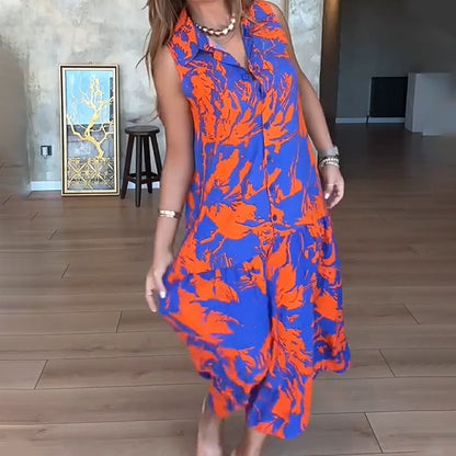 🌺 Robe Longue Sans Manches à Imprimé Exotique – Look Île & Coucher de Soleil 🌅 ✨ Tissu Léger & Coupe Élégante – Sublimez Votre Été avec Style !👗